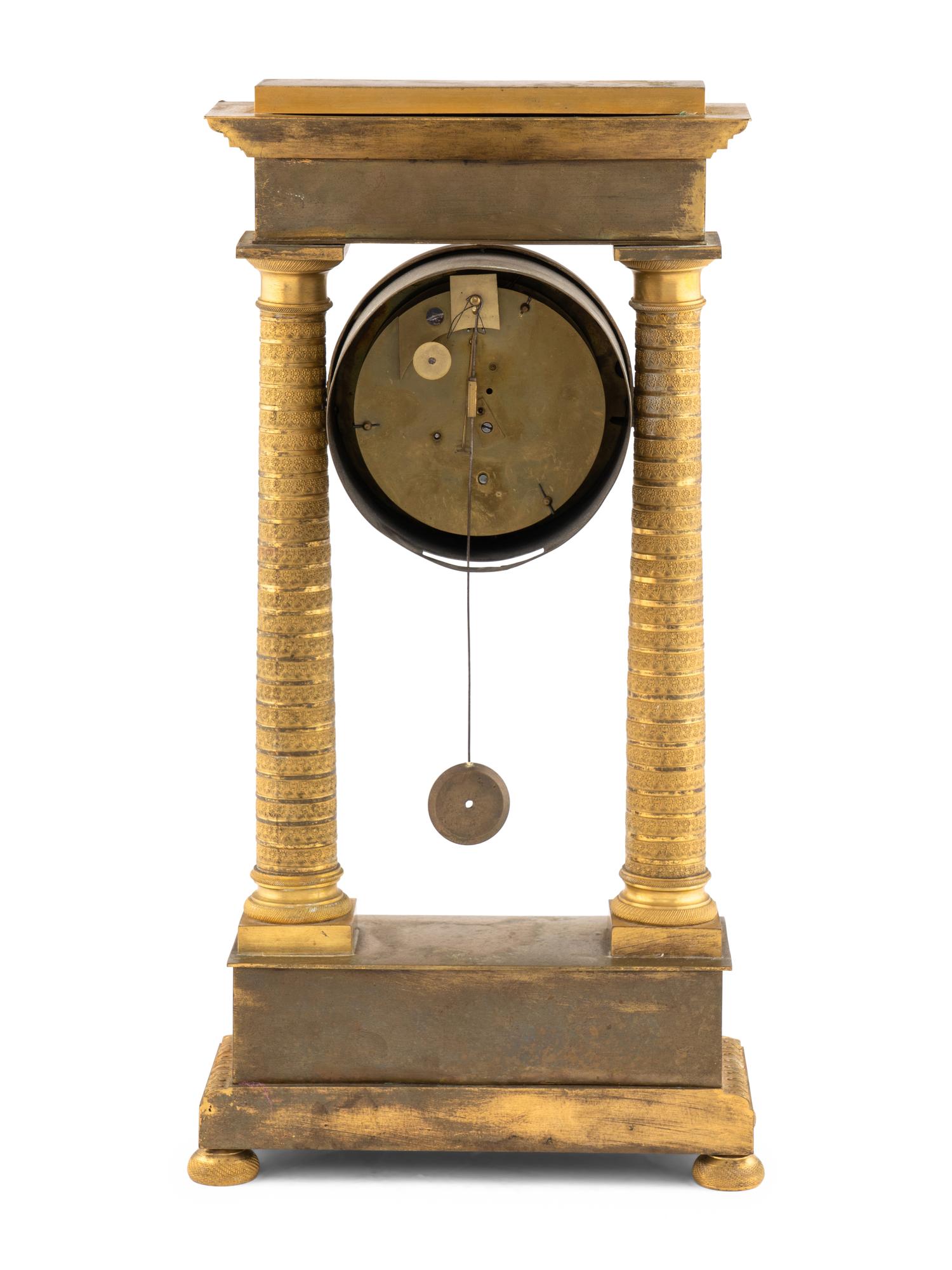 An Empire Gilt-Bronze Mantle Clock
