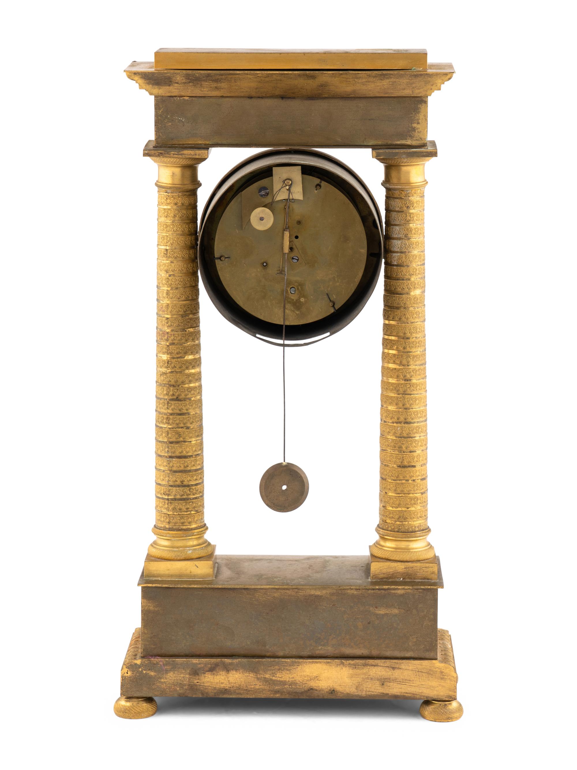 An Empire Gilt-Bronze Mantle Clock