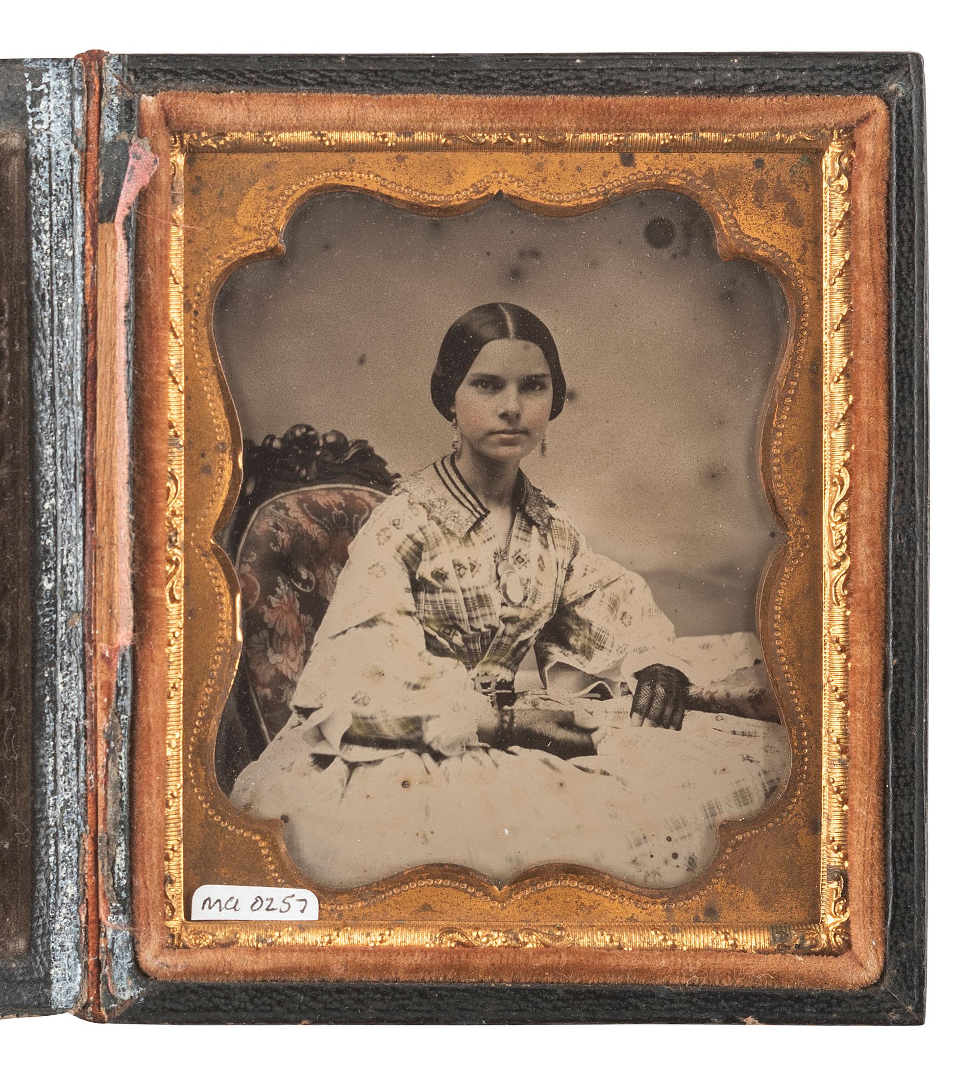 [EARLY PHOTOGRAPHY]. 35 assorted images including paper, tintype, ambrotype, and daguerreotype portraits.
