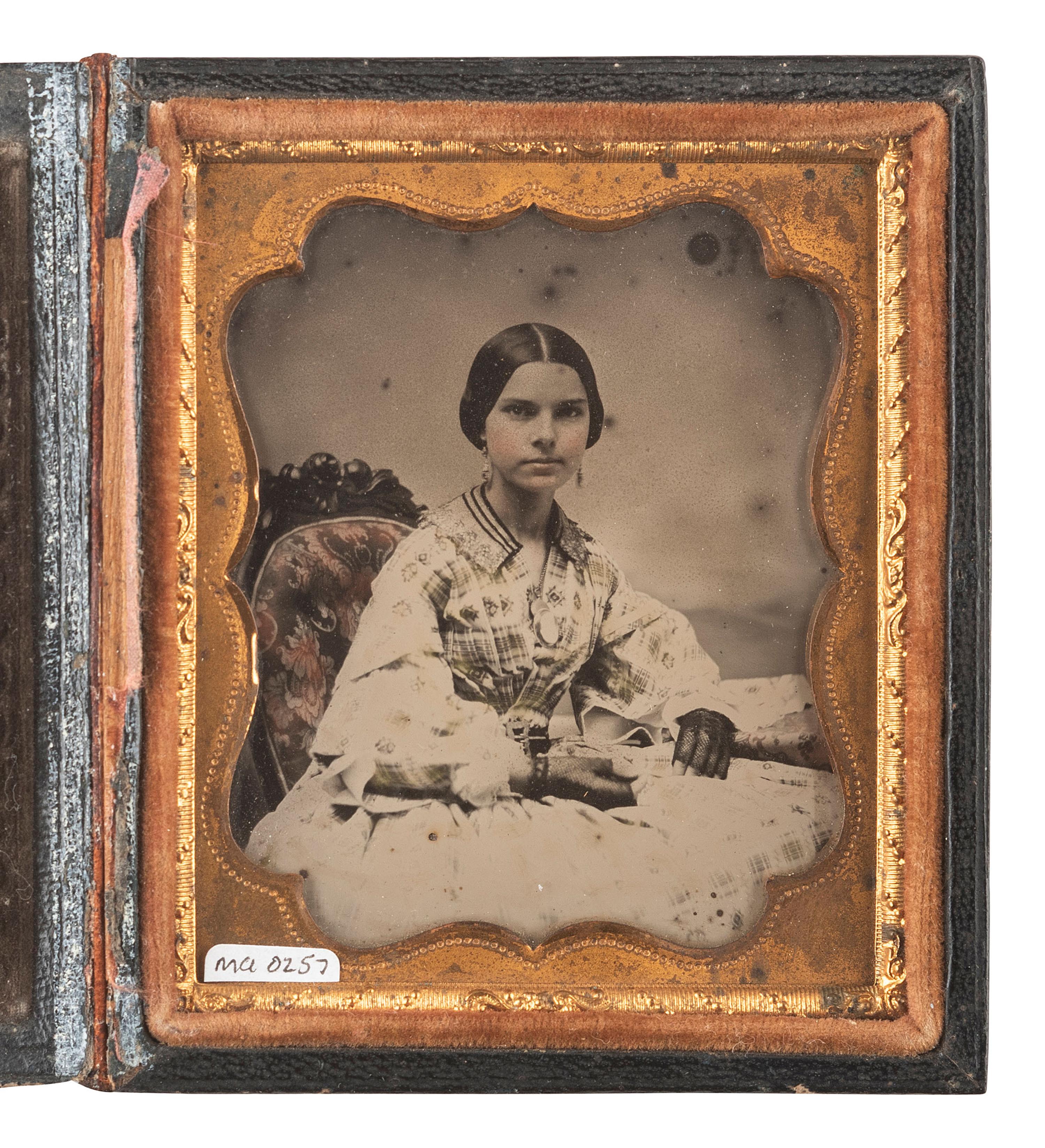 [EARLY PHOTOGRAPHY]. 35 assorted images including paper, tintype, ambrotype, and daguerreotype portraits.