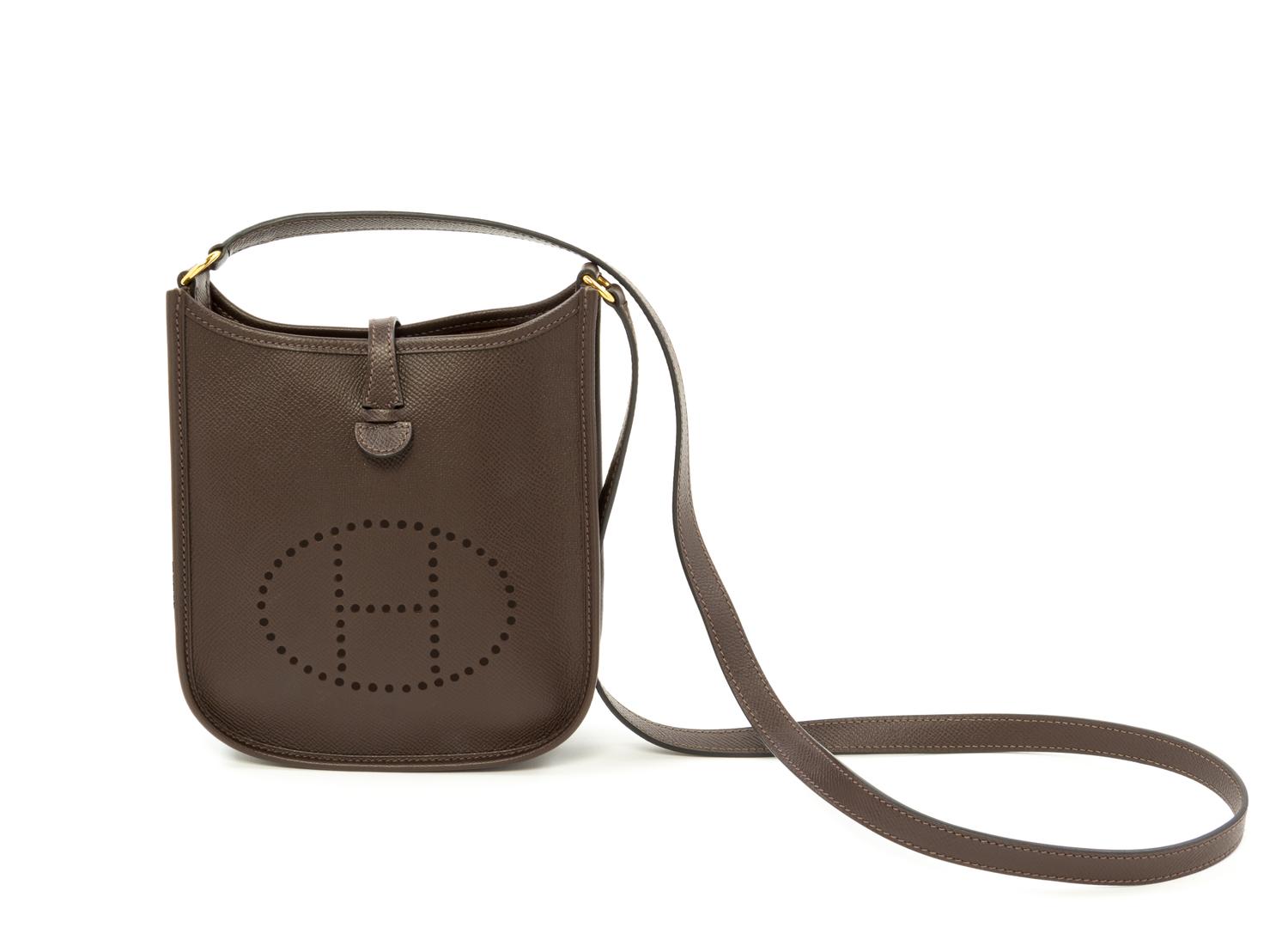 An Hermès Dark Marron Epsom Evelyne TPM, 6.7" x 7" x 2"; Strap drop: 22".
