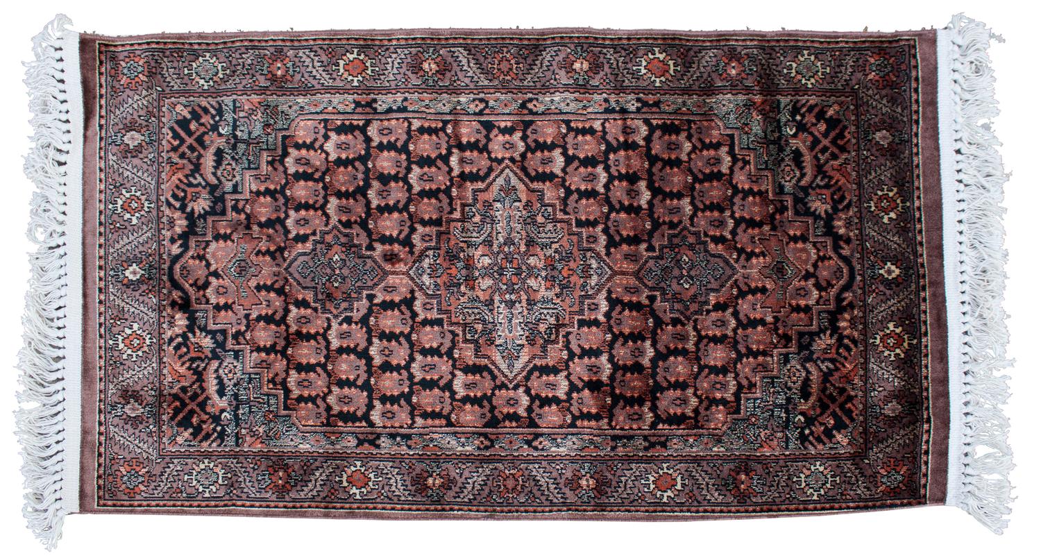 A Contemporary Rug 4 feet 1 inch x 2 feet 4 inches.