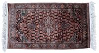 A Contemporary Rug 4 feet 1 inch x 2 feet 4 inches.