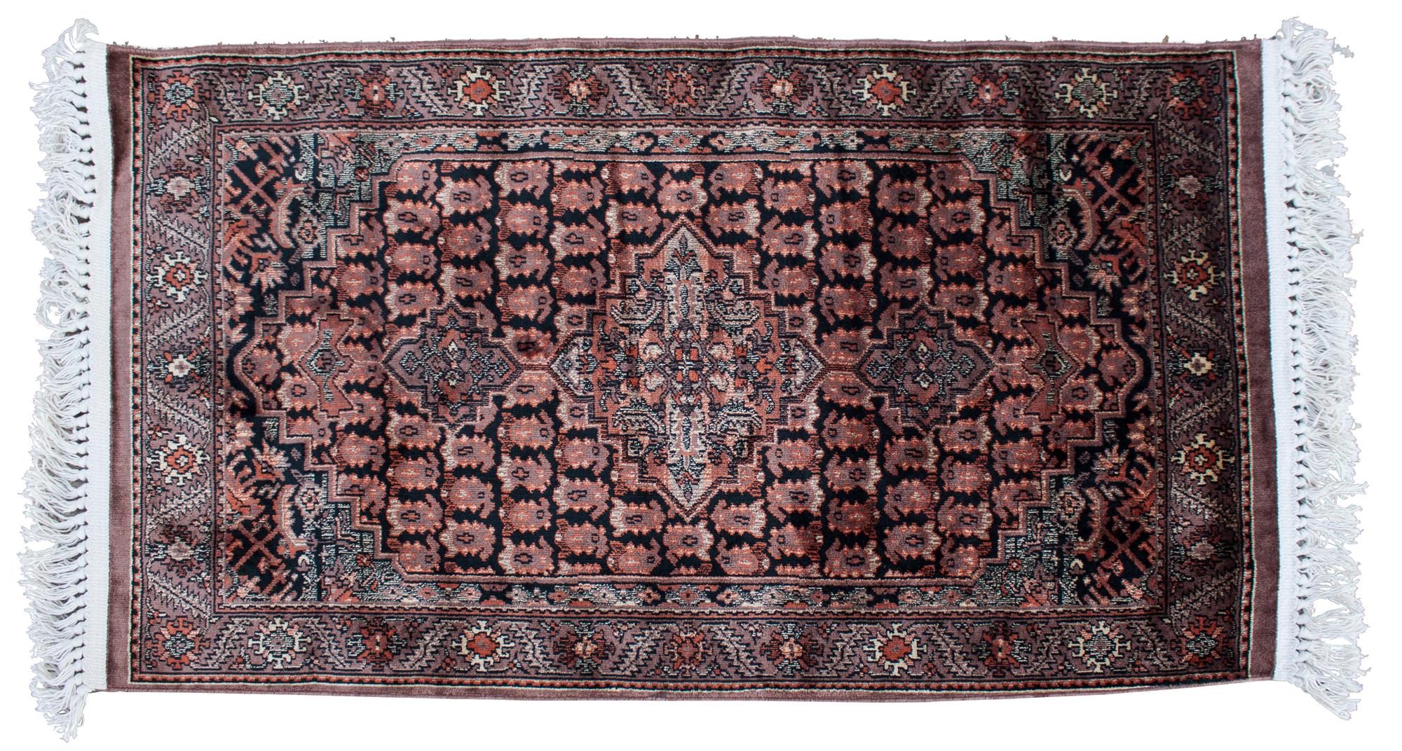 A Contemporary Rug 4 feet 1 inch x 2 feet 4 inches.
