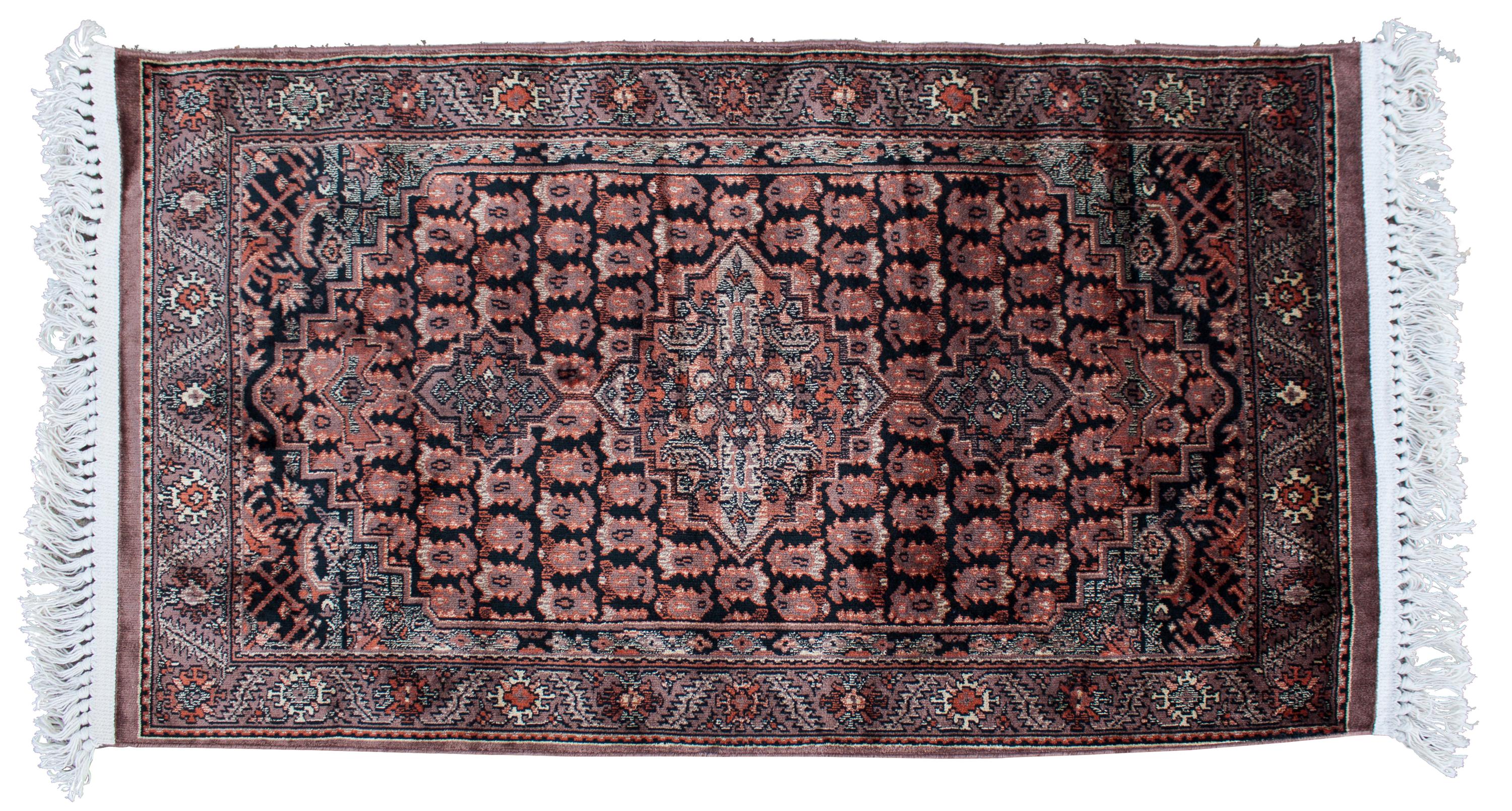 A Contemporary Rug 4 feet 1 inch x 2 feet 4 inches.