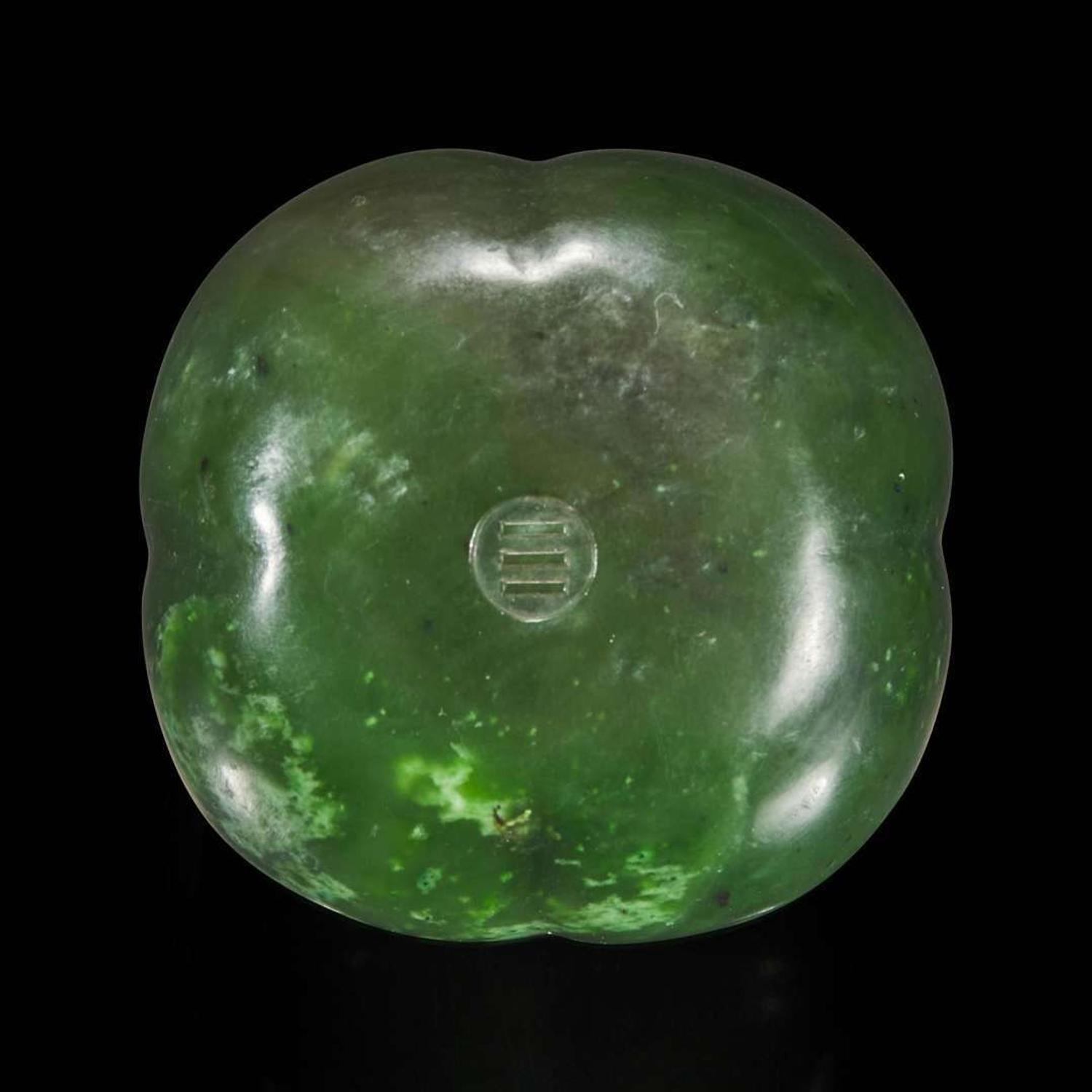 A Chinese carved spinach jade four-lobed persimmon coupe 翠玉四叶柿子形水丞