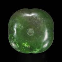 A Chinese carved spinach jade four-lobed persimmon coupe 翠玉四叶柿子形水丞