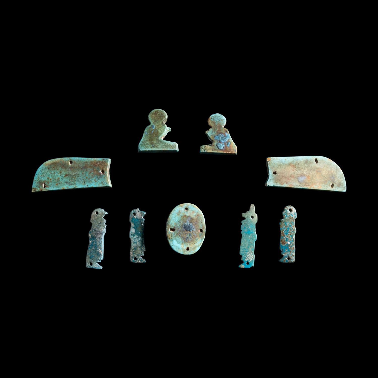 An Egyptian Faience Winged Scarab Set