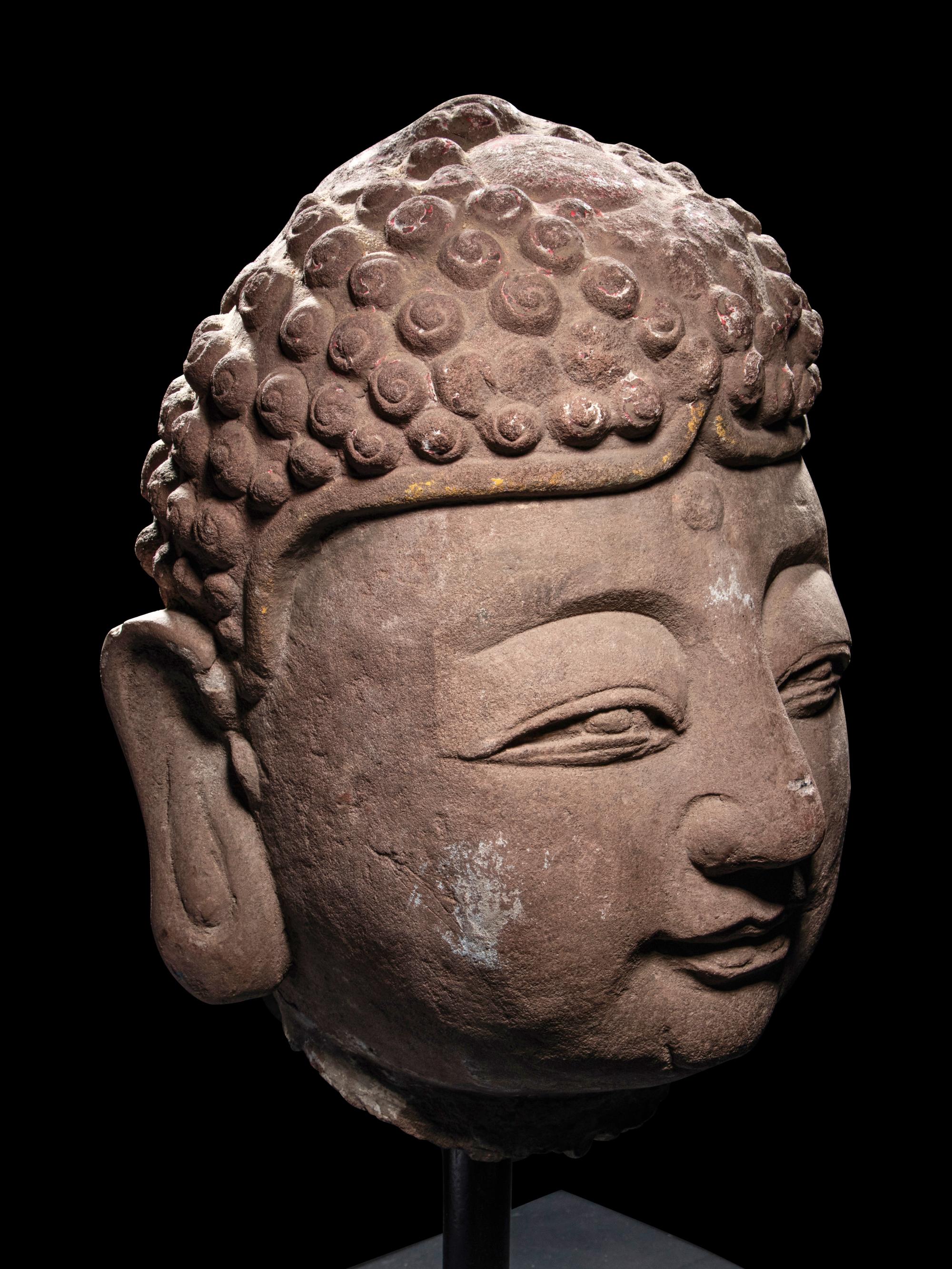 A Pair of Chinese Carved Stone Heads of Buddha