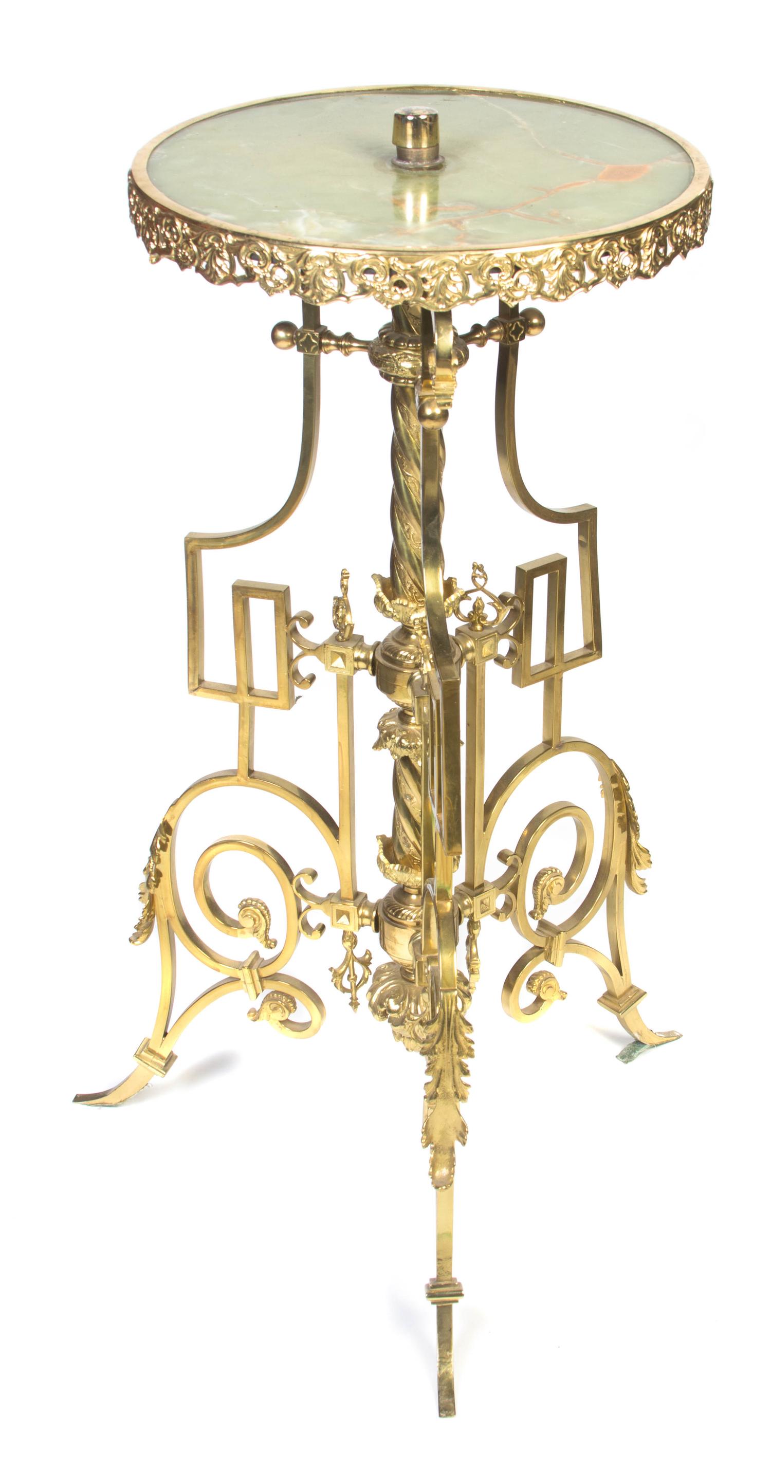 A Neoclassical Gilt Brass and Onyx Table, Height 35 x diameter 16 1/4 inches.