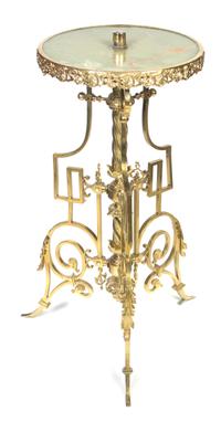 A Neoclassical Gilt Brass and Onyx Table, Height 35 x diameter 16 1/4 inches.