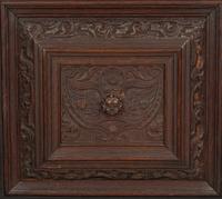 A Pair of Continental Carved Oak Cabinets on Stands