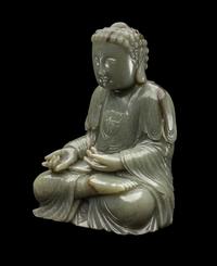 A Chinese Celadon Jade Figure of Medicine Buddha