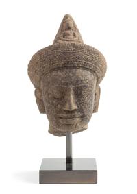 A Khmer Sandstone Head of a Deity Height 7 1/8 inches.