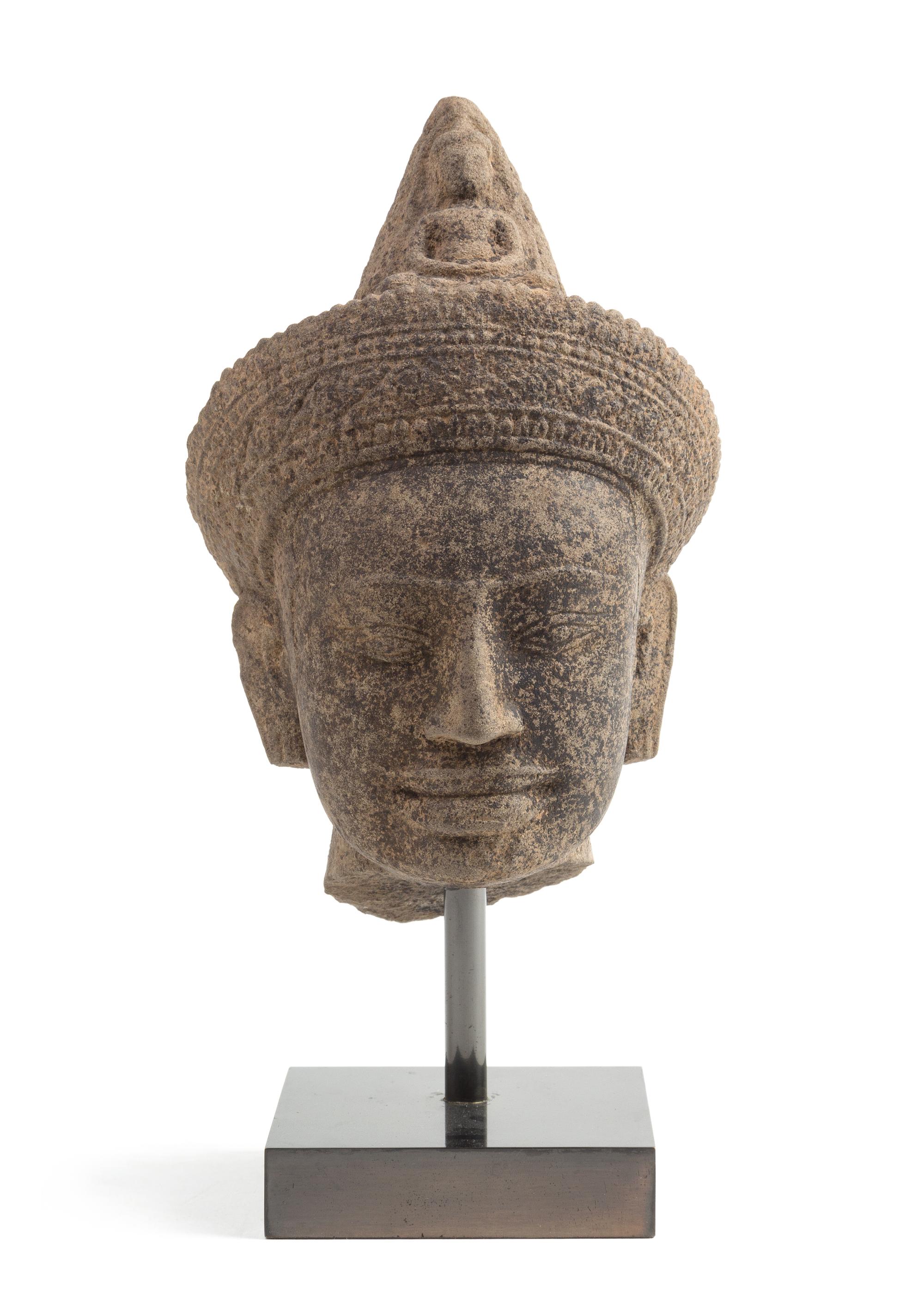 A Khmer Sandstone Head of a Deity Height 7 1/8 inches.