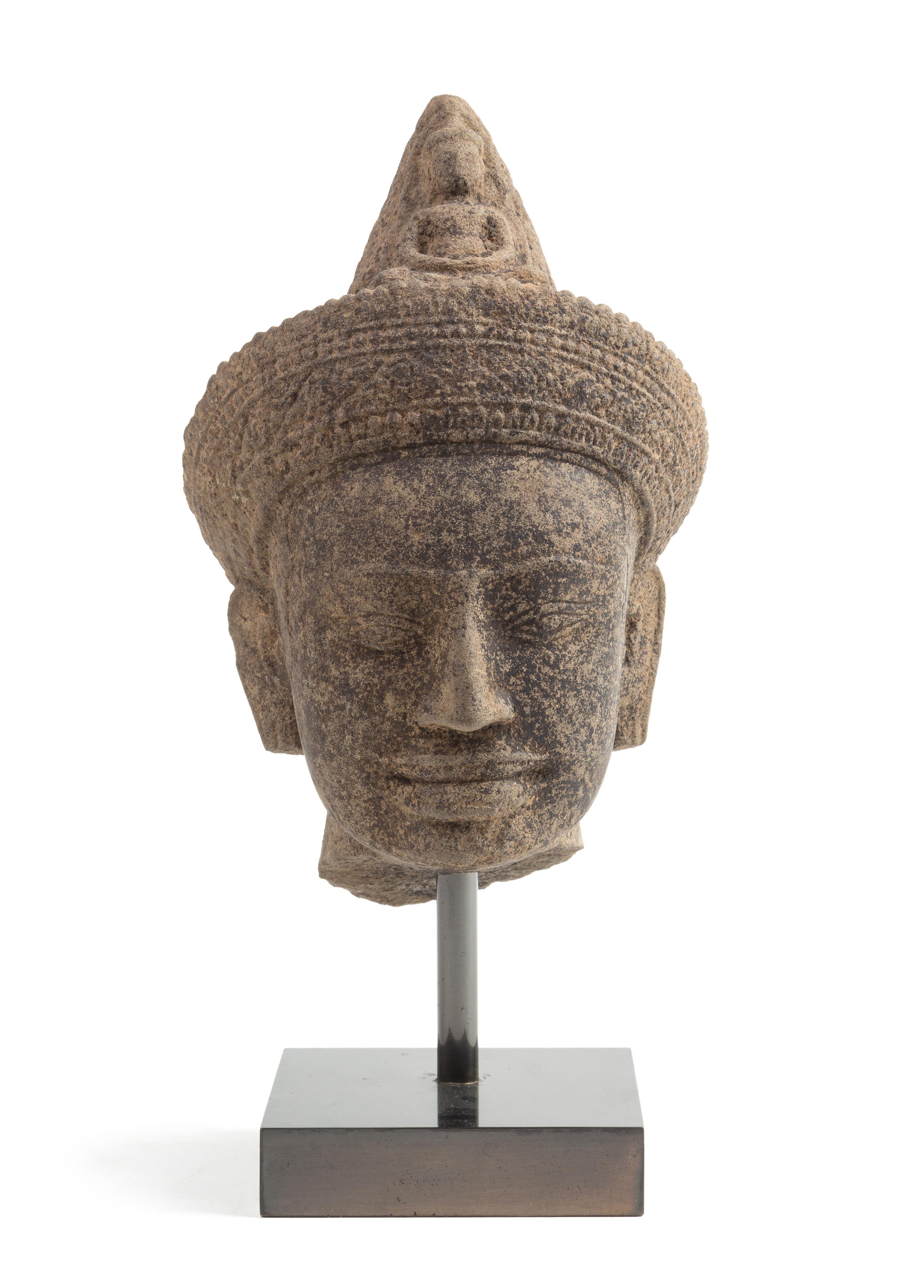 A Khmer Sandstone Head of a Deity Height 7 1/8 inches.