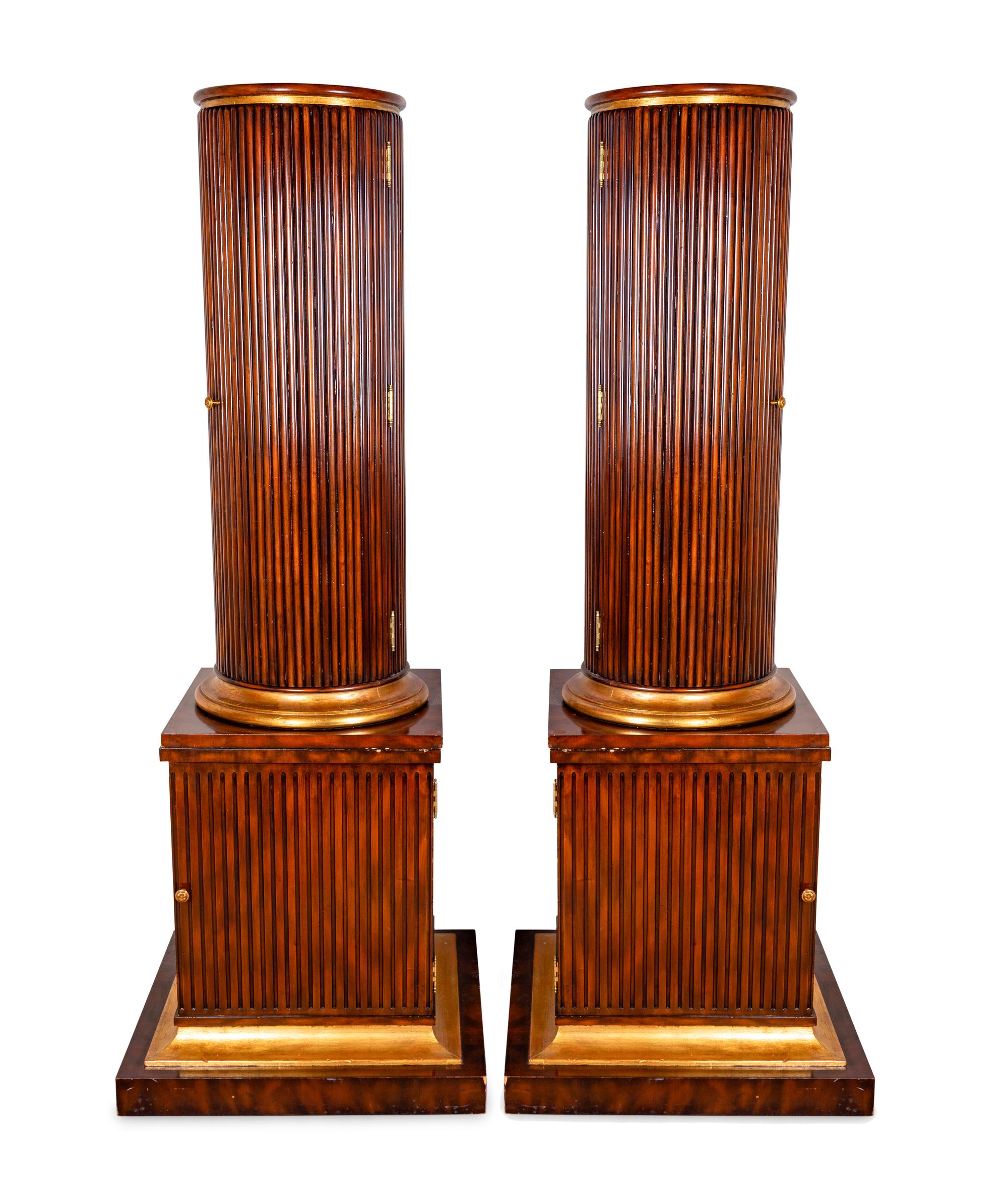 A Pair of Regency Style Fluted Mahogany Columnar Cabinets — 20TH CENTURY