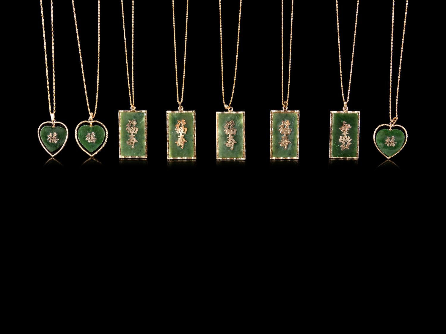 Eight Chinese Gilt Metal and Spinach Jade Necklaces