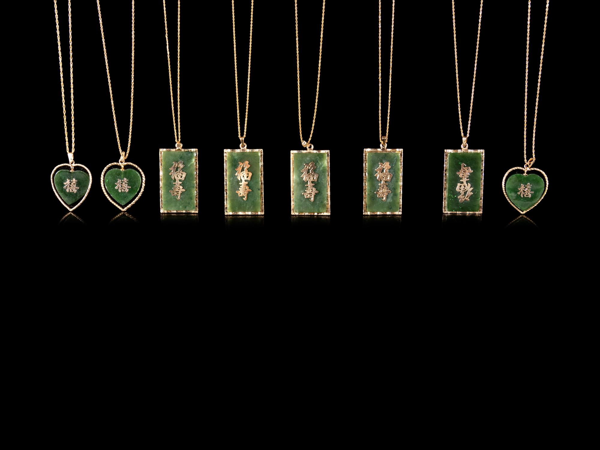 Eight Chinese Gilt Metal and Spinach Jade Necklaces