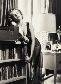Philippe Halsman (1906-1979) Marilyn Monroe listening to music, 1952