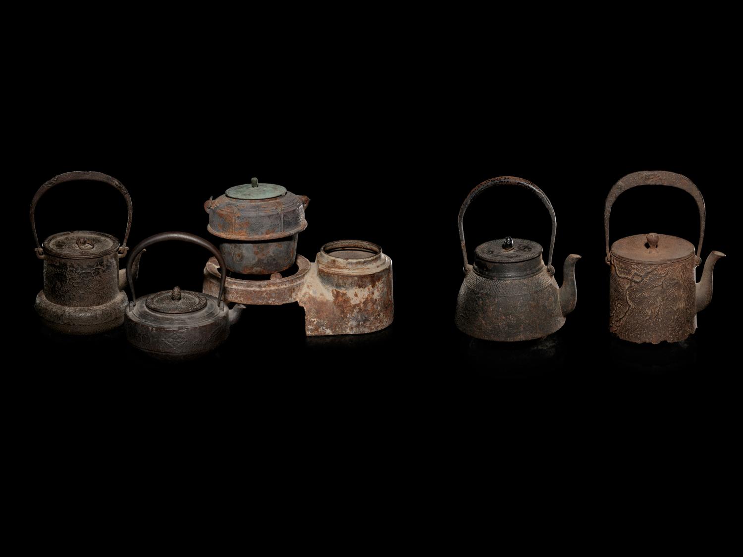 Five Japanese Cast Iron Teapots, Tetsubin , and Burner