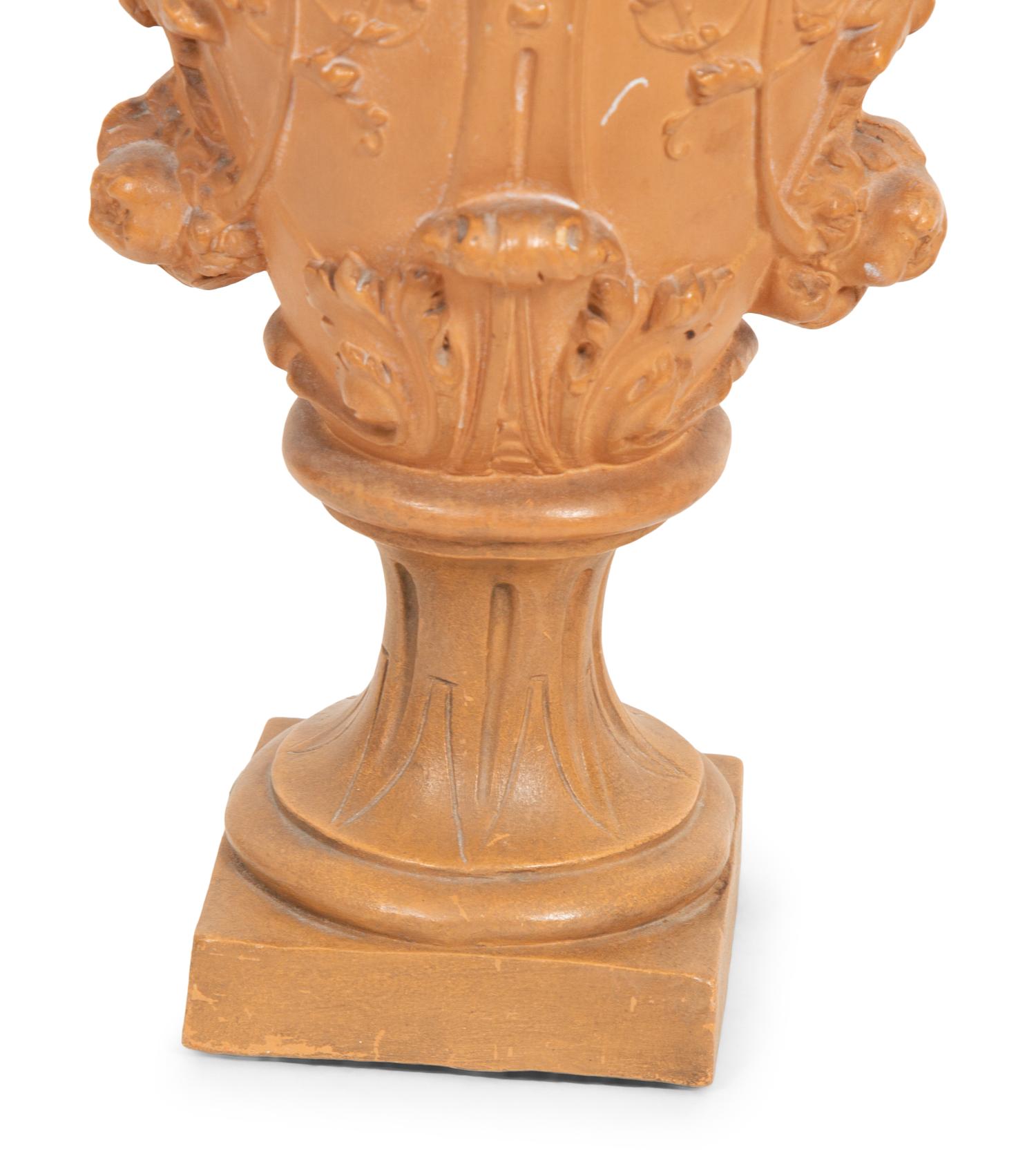 A Pair of Glazed Terracotta Vases now Mounted as Lamps