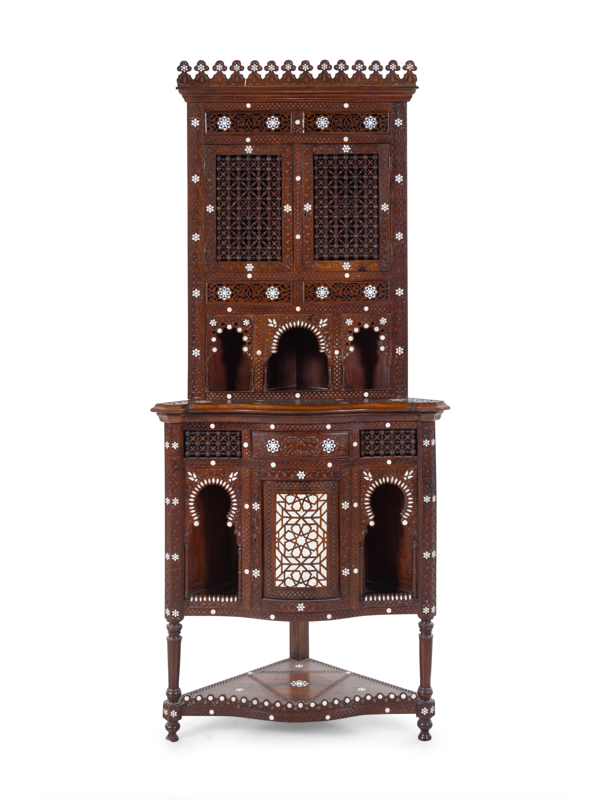 An Ottoman Turkish Carved and Mother-of-Pearl Inlaid Corner Cabinet