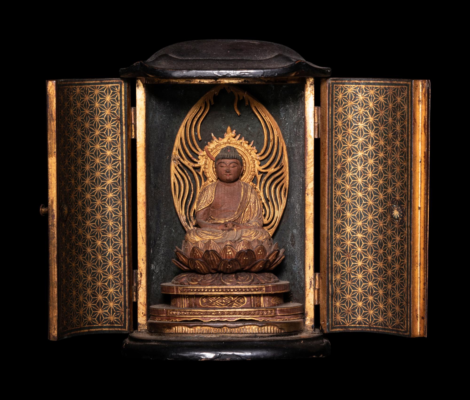 A Gilt Wood Figure of Buddha Shakyamuni and A Gilt Metal Mounted Black Lacquered Wood Traveling Shrine