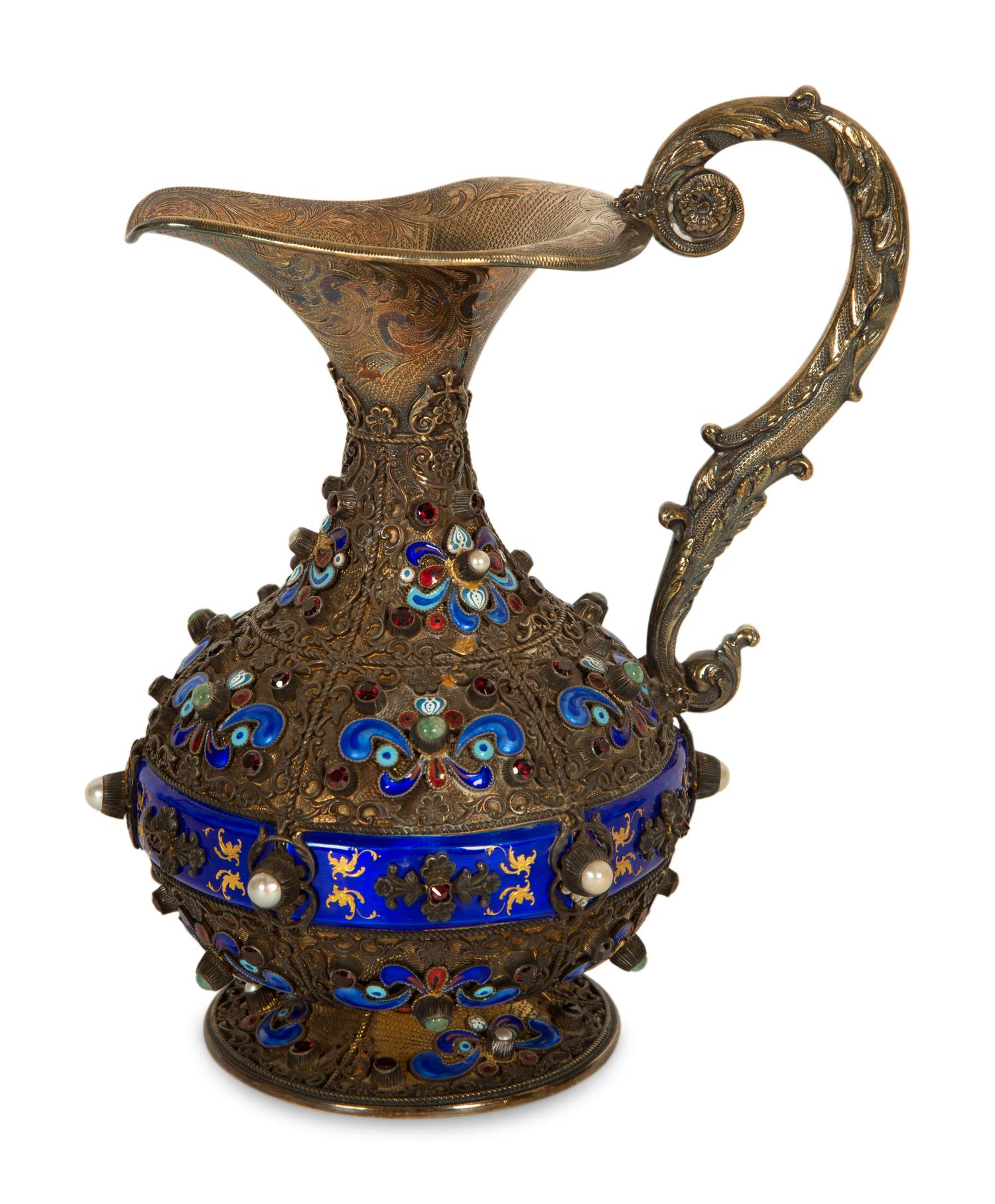 A Continental Enameled and Gem-Encrusted Silver-Gilt Wine Ewer