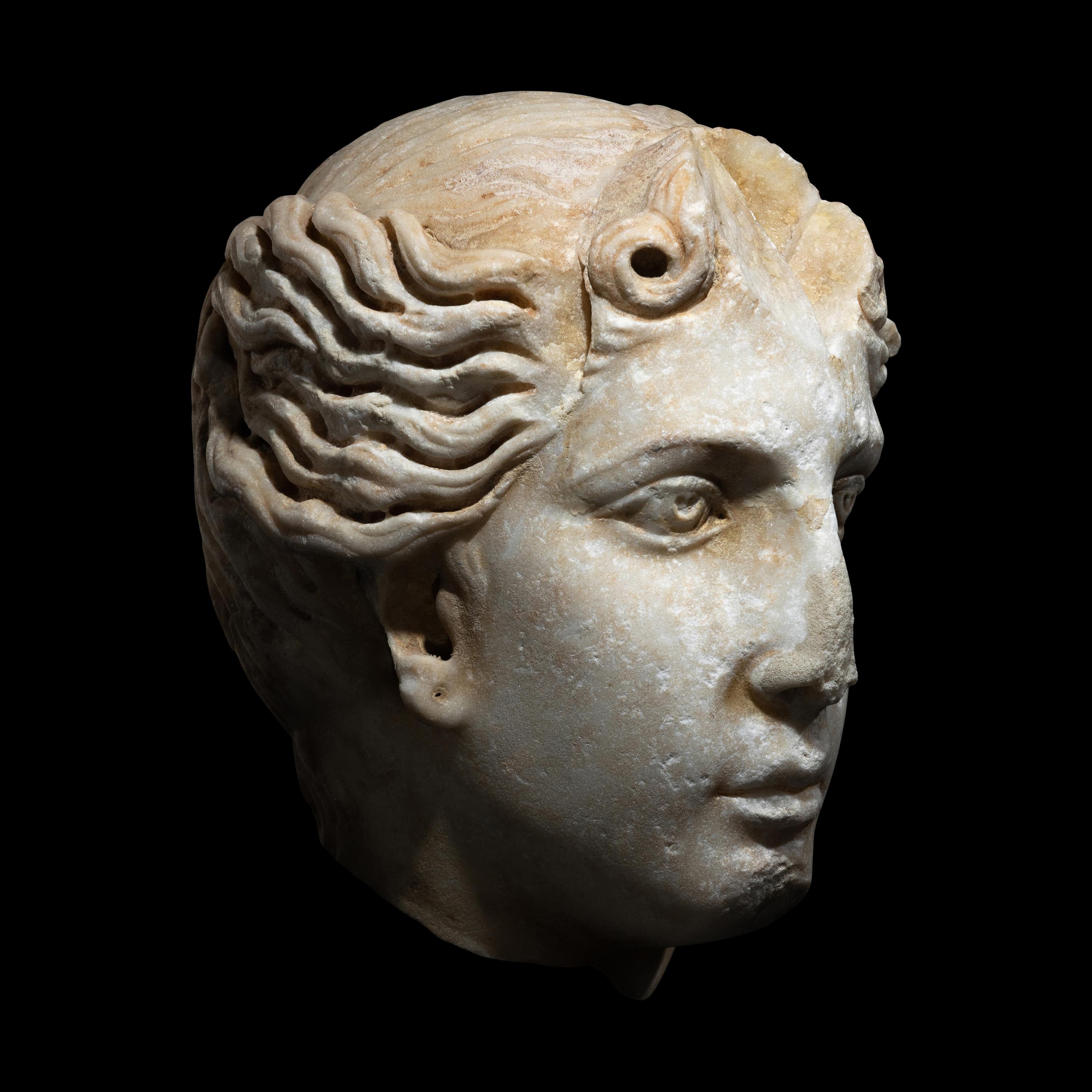 A Roman Marble Head of a Goddess