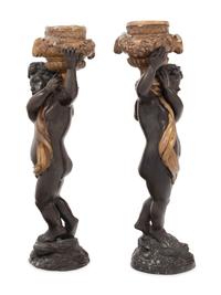 A Pair of Gilt and Patinated Bronze Figures of Cherubs