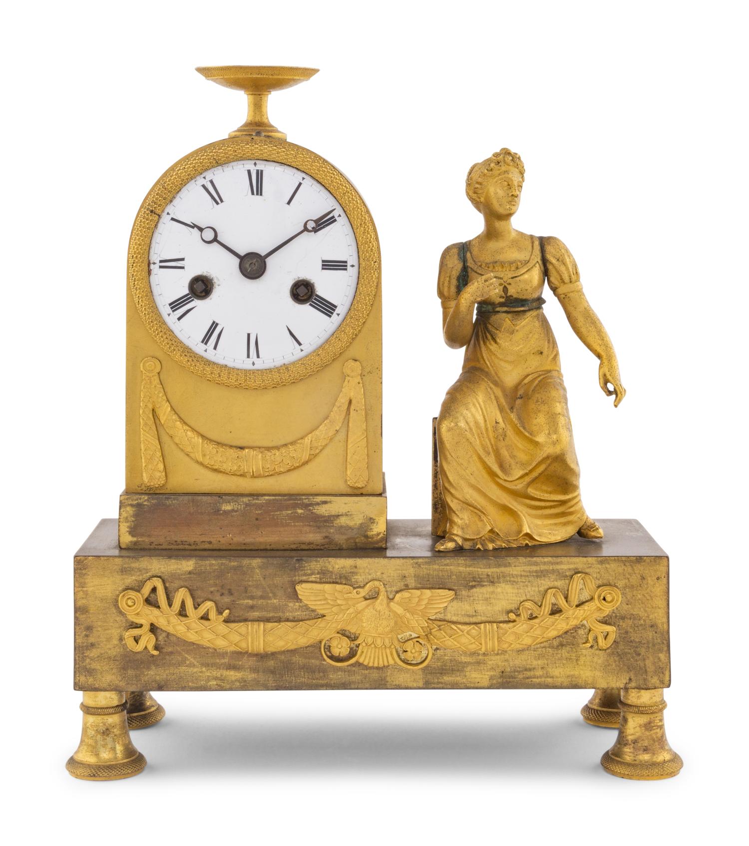 An Empire Gilt Bronze Clock