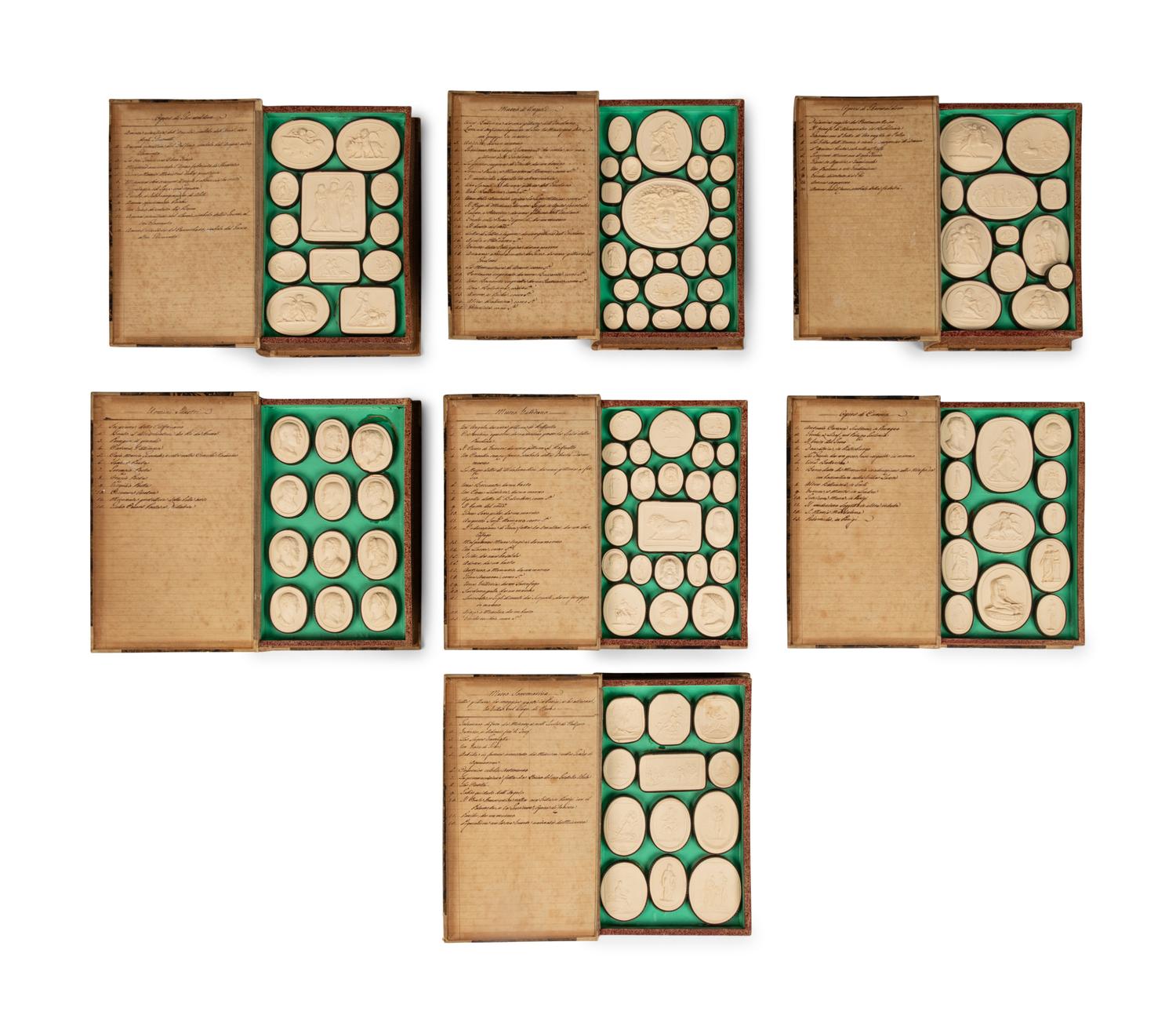 A Collection of Grand Tour Plaster Intaglios in Book-Form Cases