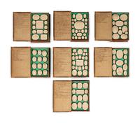 A Collection of Grand Tour Plaster Intaglios in Book-Form Cases