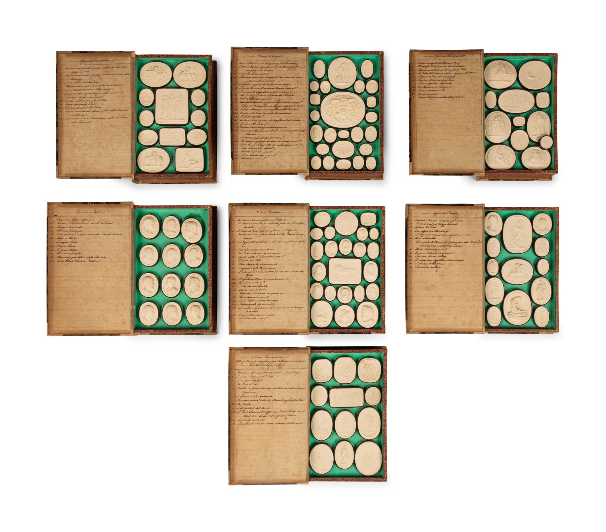 A Collection of Grand Tour Plaster Intaglios in Book-Form Cases