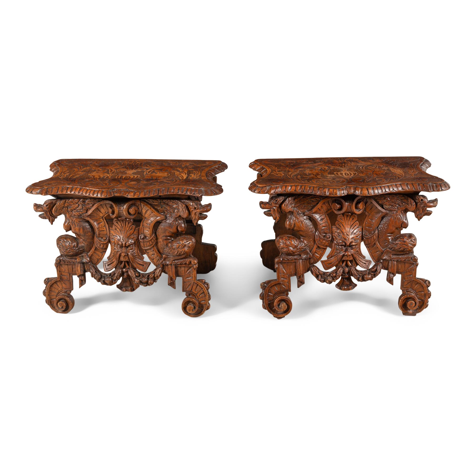 A Pair of Italian Carved Walnut Sgabello Stools