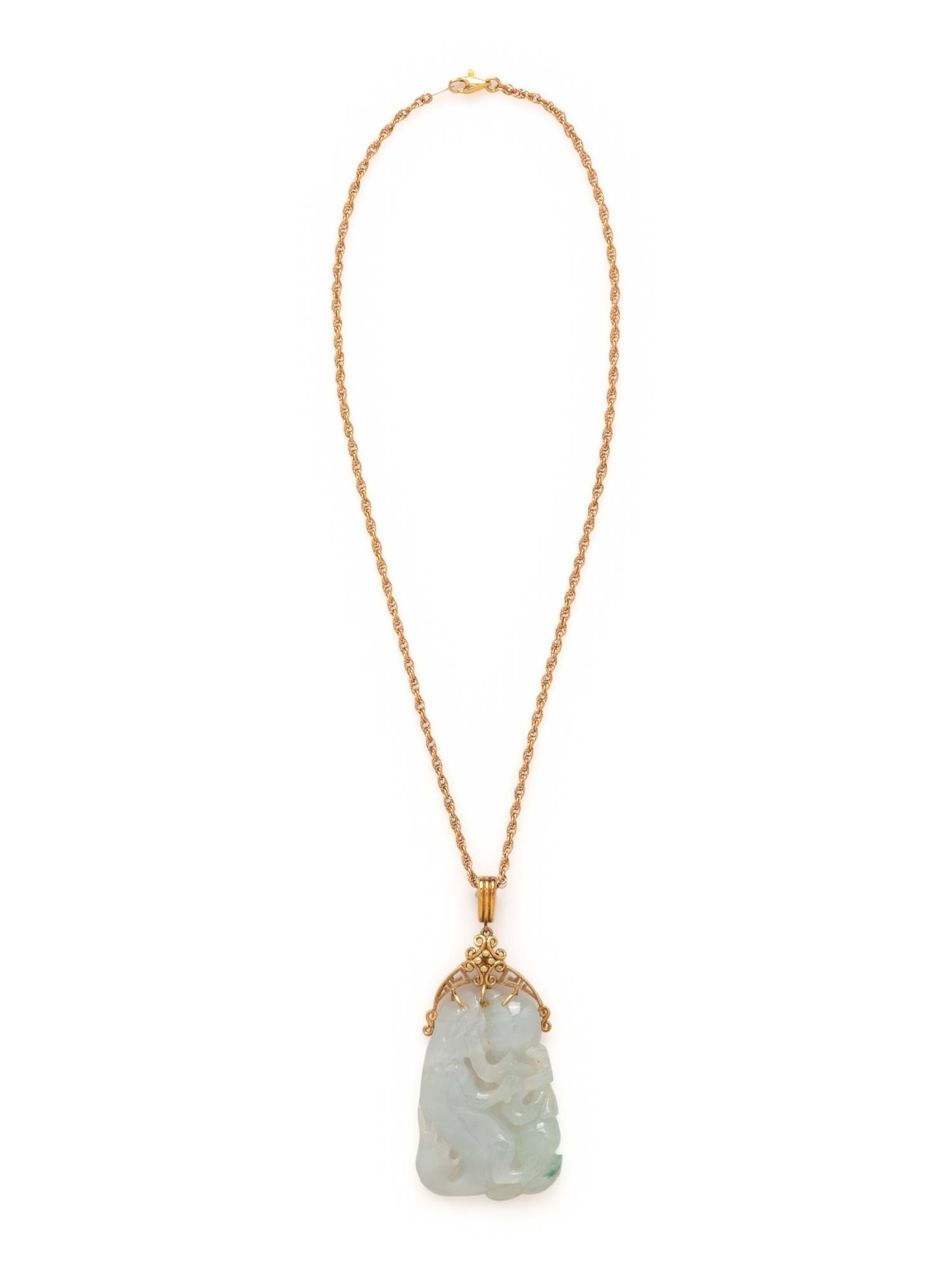 YELLOW GOLD AND CARVED JADE PENDANT/NECKLACE