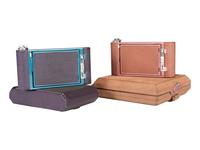 [EARLY PHOTOGRAPHY]. Two Kodak Petite Cameras, one with original vanity case.