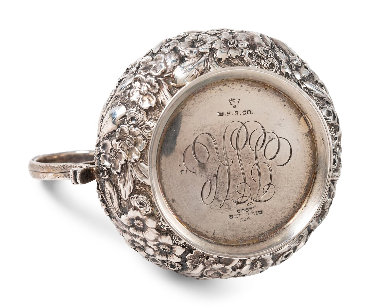 A Repousse Silver Three-Piece Tea Service