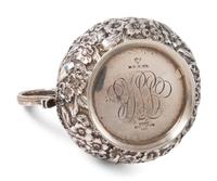A Repousse Silver Three-Piece Tea Service