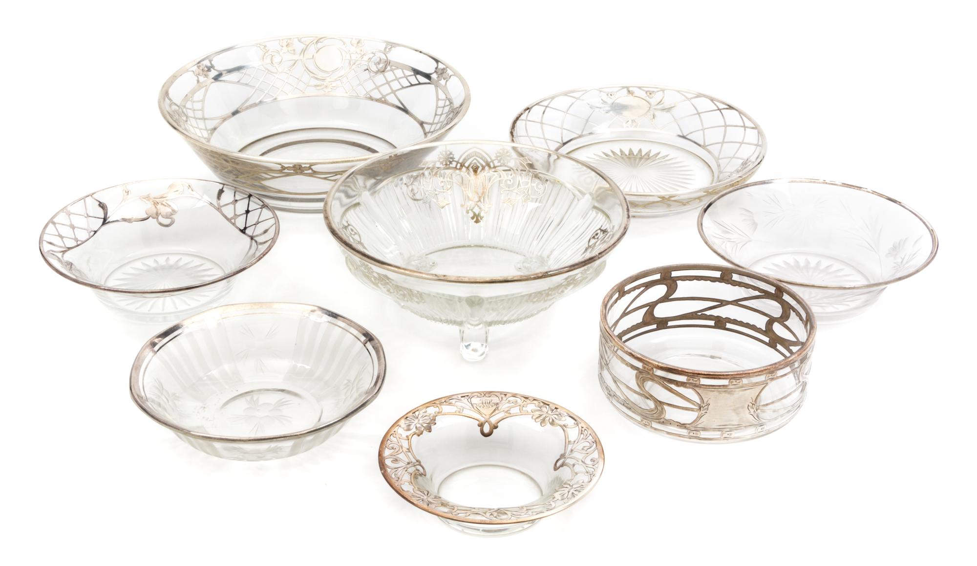 A Group of Silver Overlay Glass Bowls Diameter of largest 8 1/8 inches.