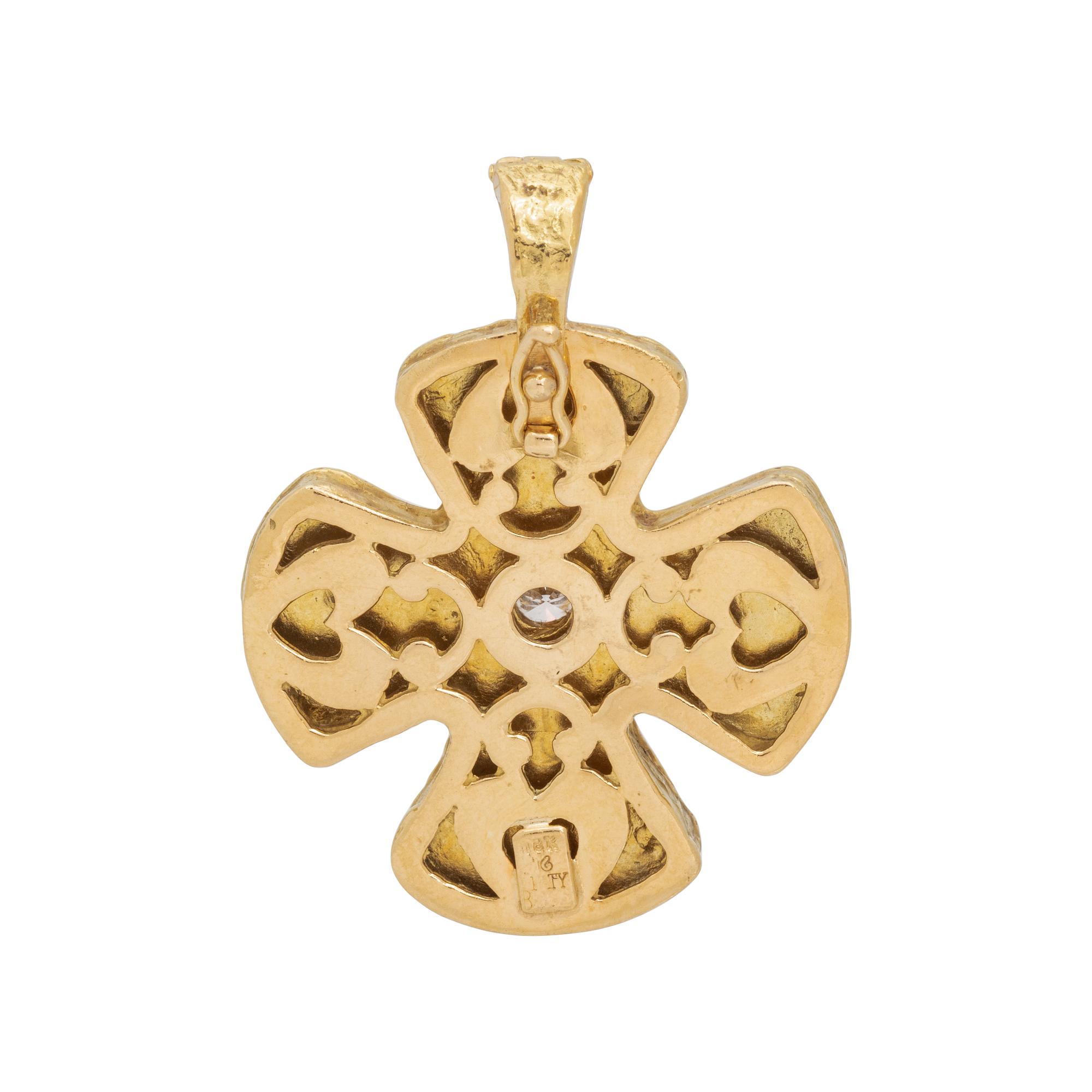 KATY BRISCOE, YELLOW GOLD AND DIAMOND 'MARY CROSS' PENDANT