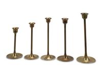 A Collection of Nineteen Brass Candlesticks