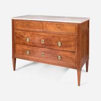 A French Directoire carved fruitwood commode with white marble top circa 1800