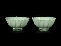 A Pair of Chinese Celadon Glass 'Lotus' Bowls