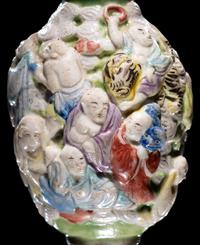 A Chinese Molded Famille Rose Porcelain Snuff Bottle