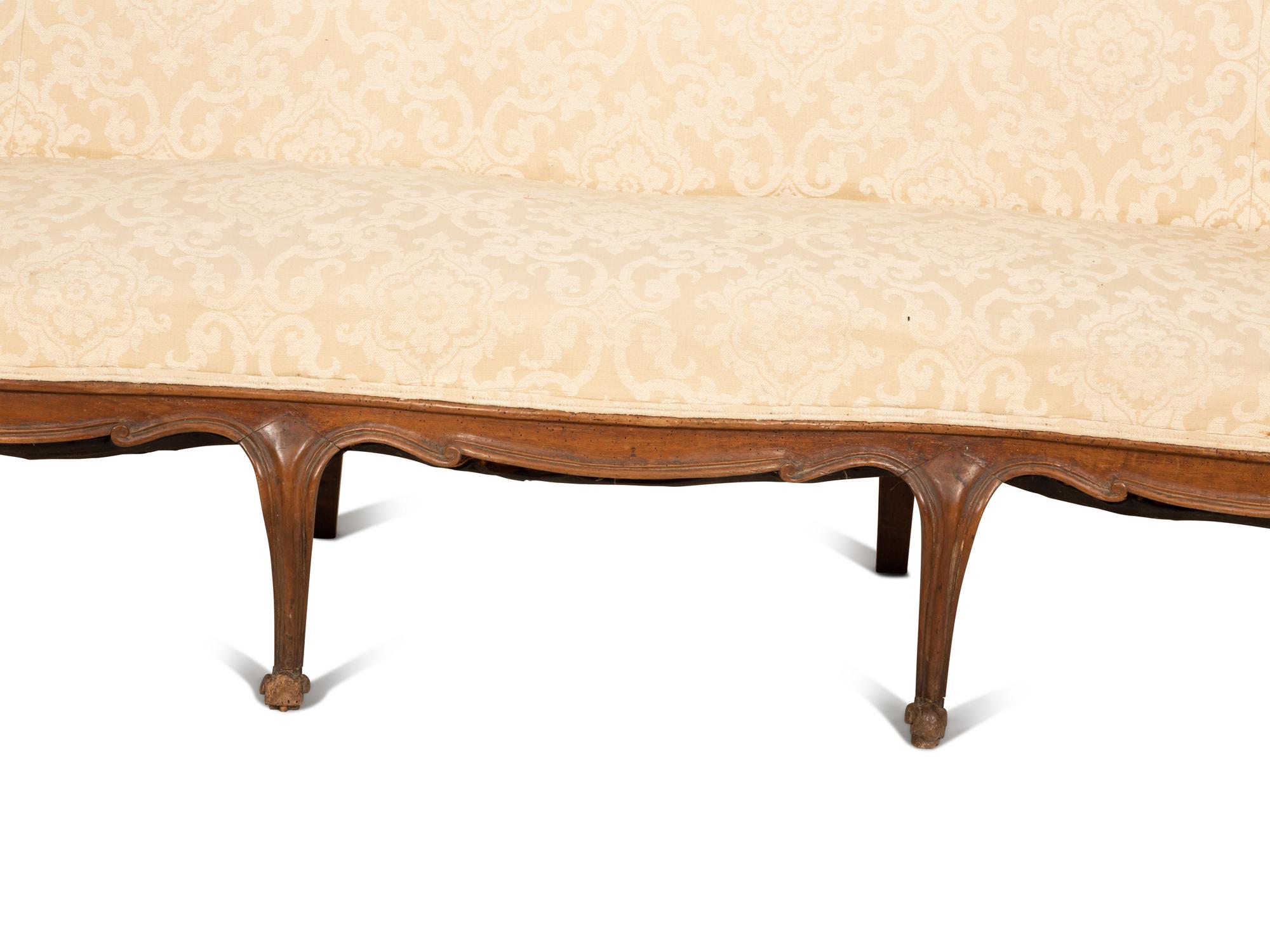 A Venetian Style Walnut Sofa