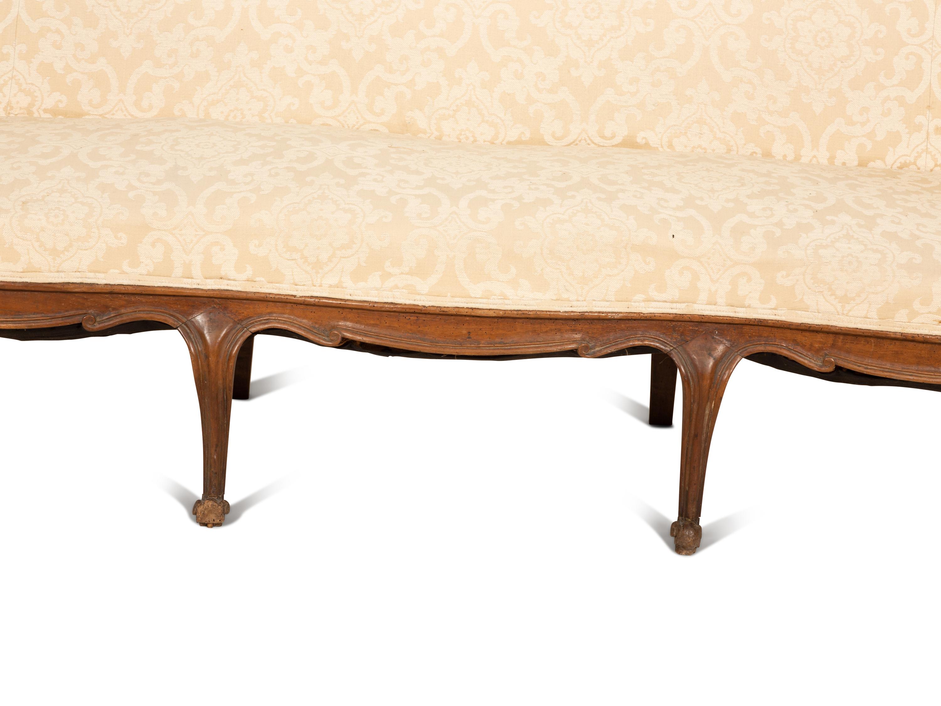A Venetian Style Walnut Sofa