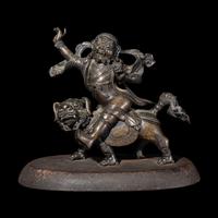 A Sino-Tibetan Bronze Figure of a Guardian