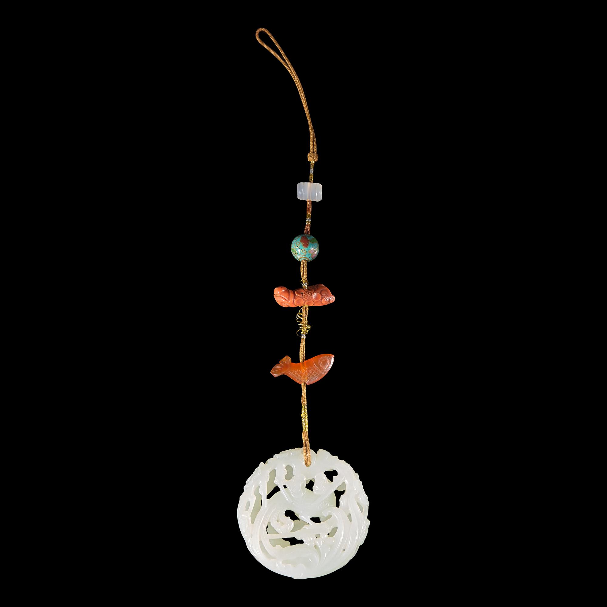 A Chinese White Jade Reticulated 'Phoenix' Pendant — 白玉鏤雕鳳鳥紋玉子岡佩